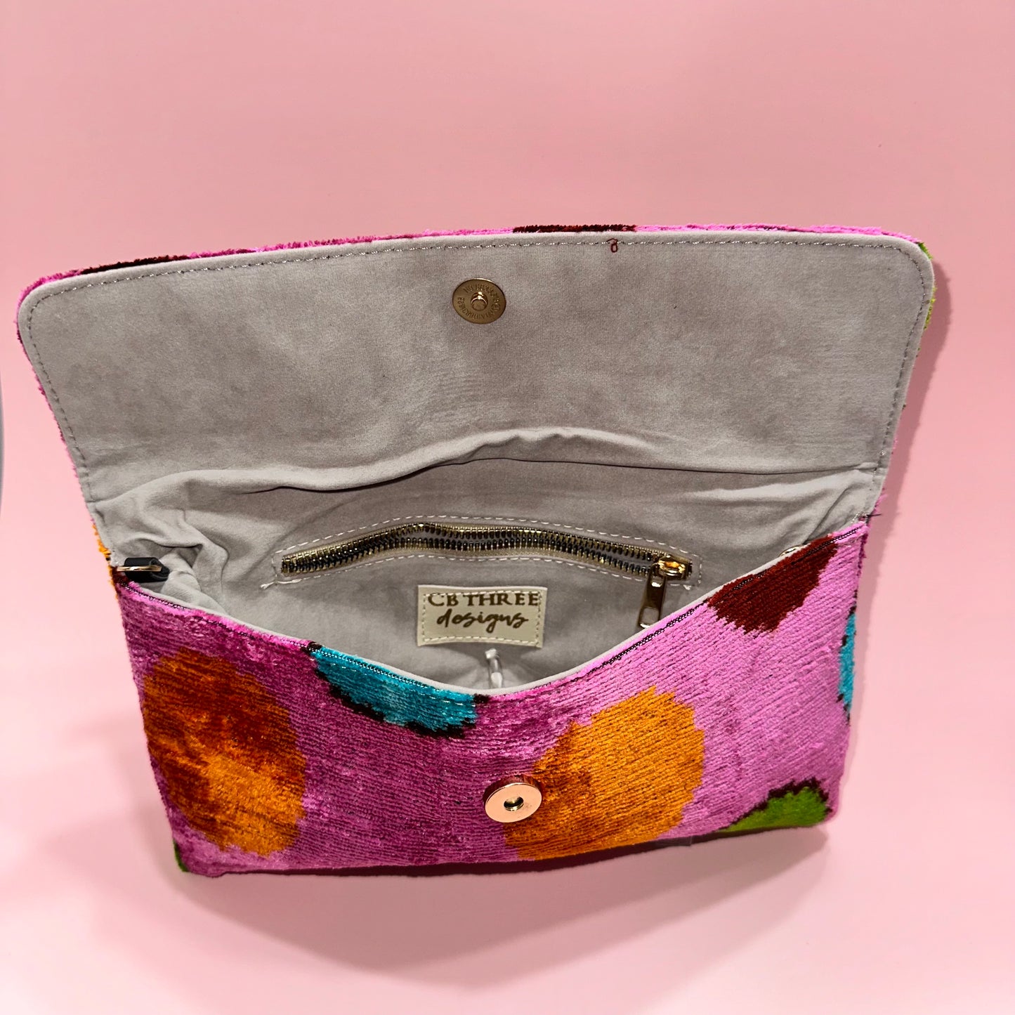 Multi-colored dots Clutch